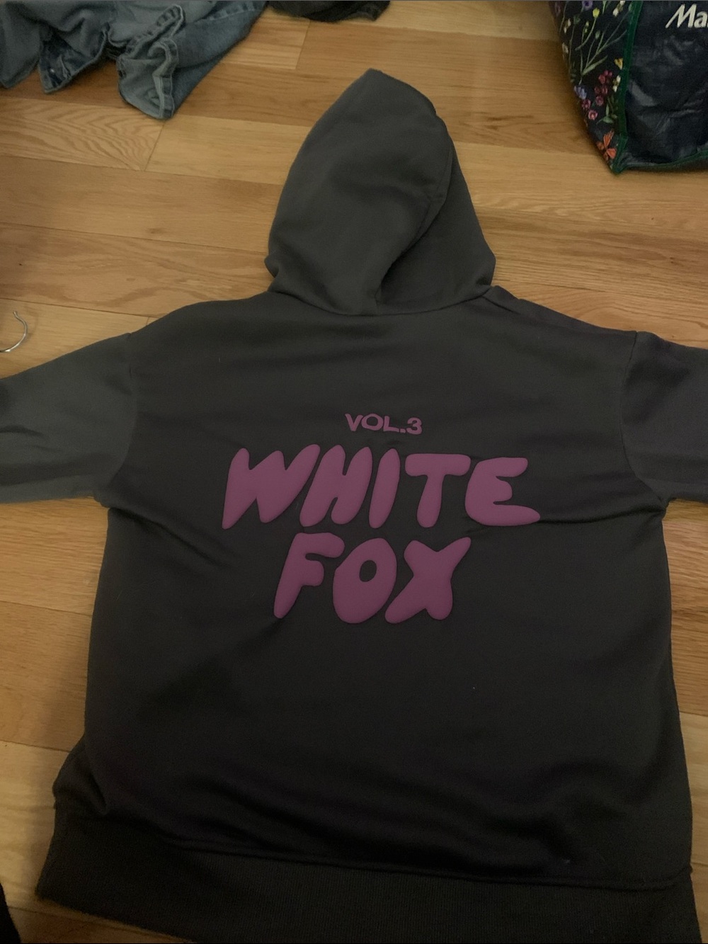 White Fox Boutique Black Hoodie with Purple 'WHITE FOX' Back Graphic